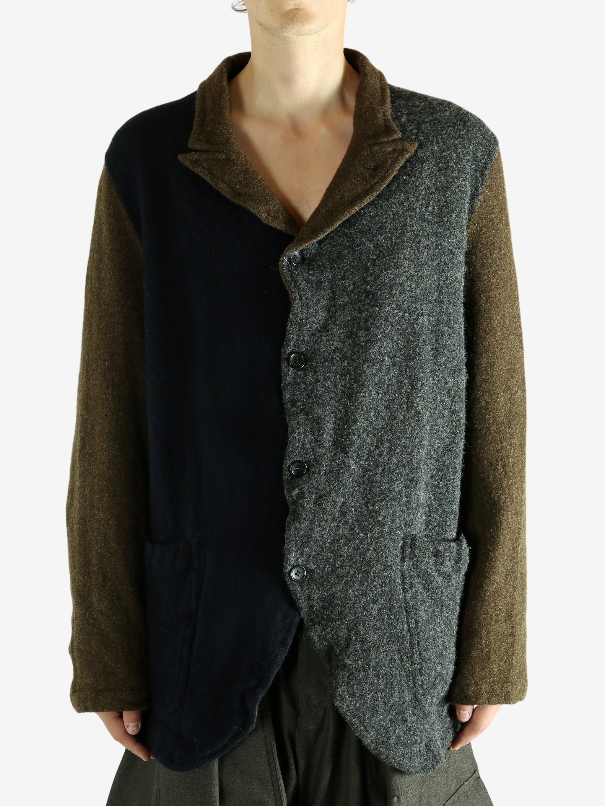 Brown jacket worn by a person. showing the jacket's fit