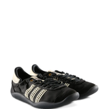 Black sneakers, side view