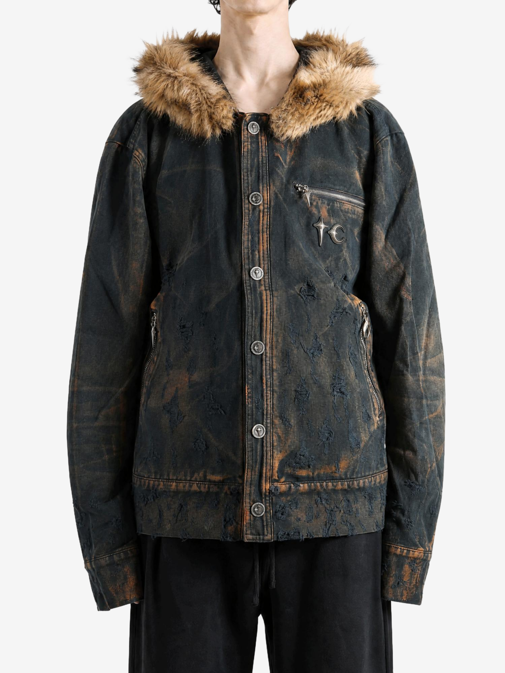 Black jacket worn by a person, showing the jacket fit