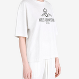 White t-shirt worn by a person, showing the t-shirt fit