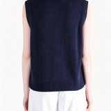 Navy top worn by a person, showing the top fit