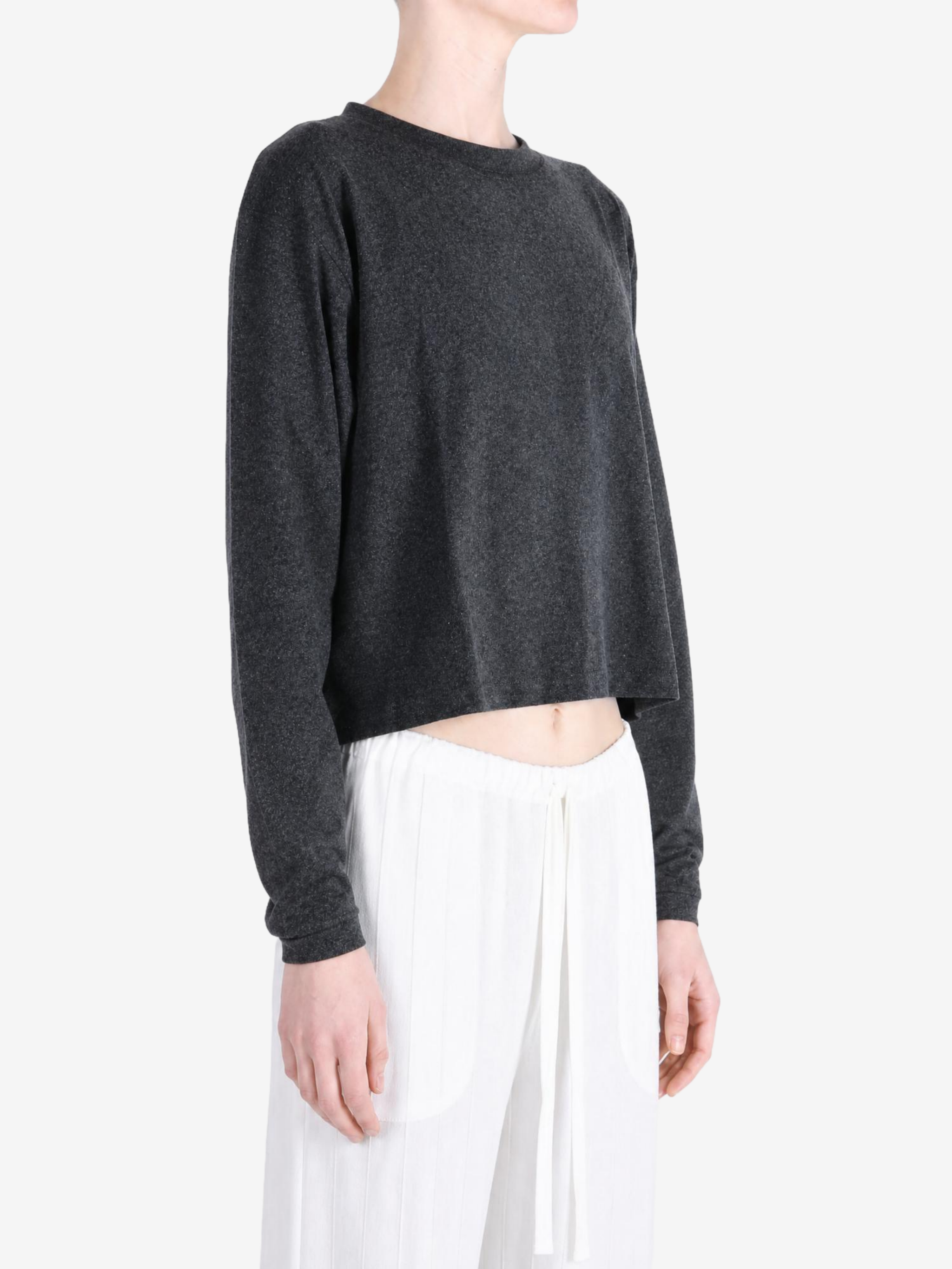 Grey t-shirt worn by a person, showing the t-shirt fit