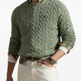 Green knitwears,worn by a person, showing the knitwears fit