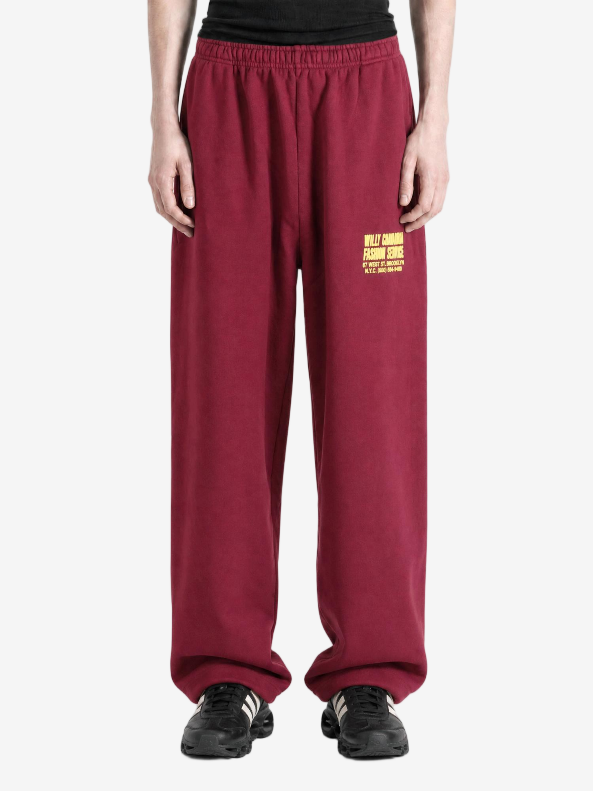 Burgundy pants, full body view