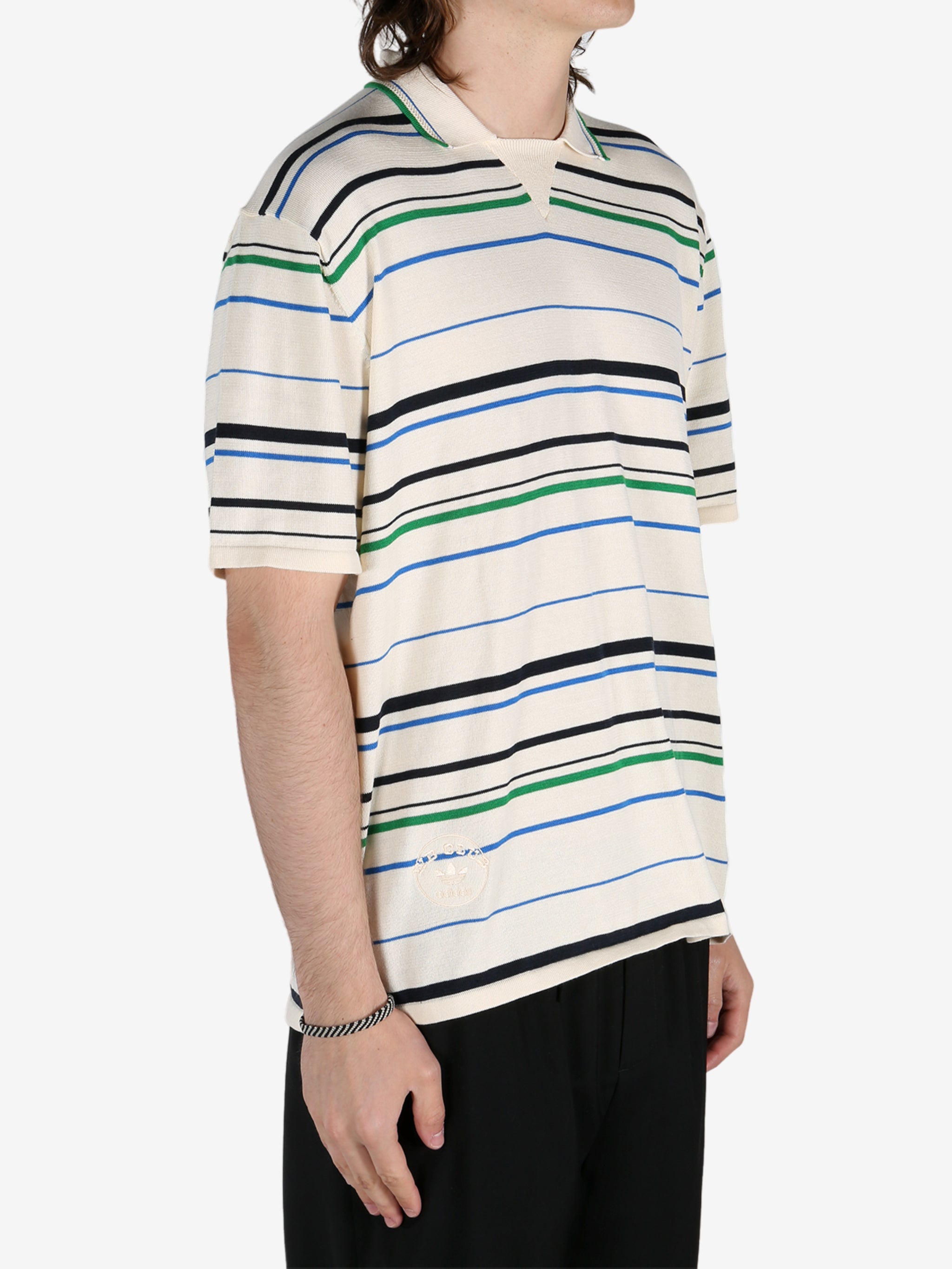 Tan shirt worn by a person, showing the shirt's fit