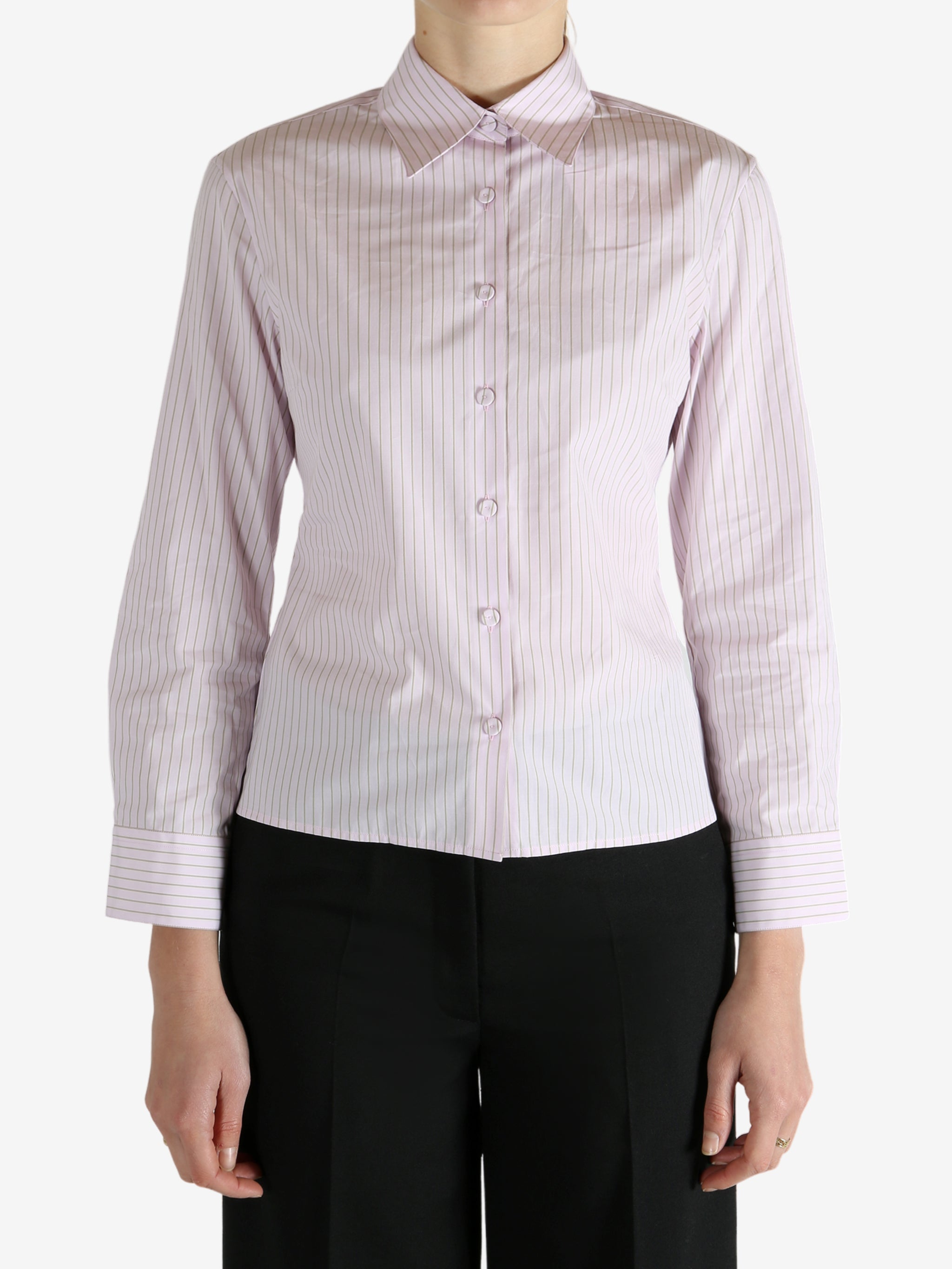 Pink shirt worn by a person, showing the shirt's fit