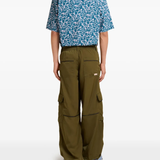 green pants, full body view