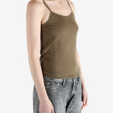 Tan top worn by a person, showing the top's fit