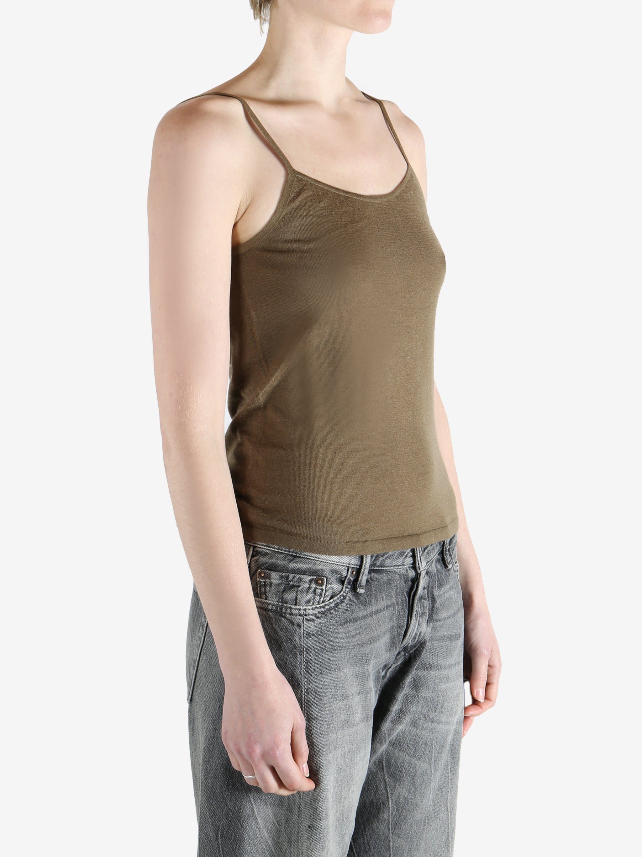 Tan top worn by a person, showing the top's fit