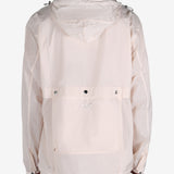 Pink jacket worn by a person, showing the jacket's fit