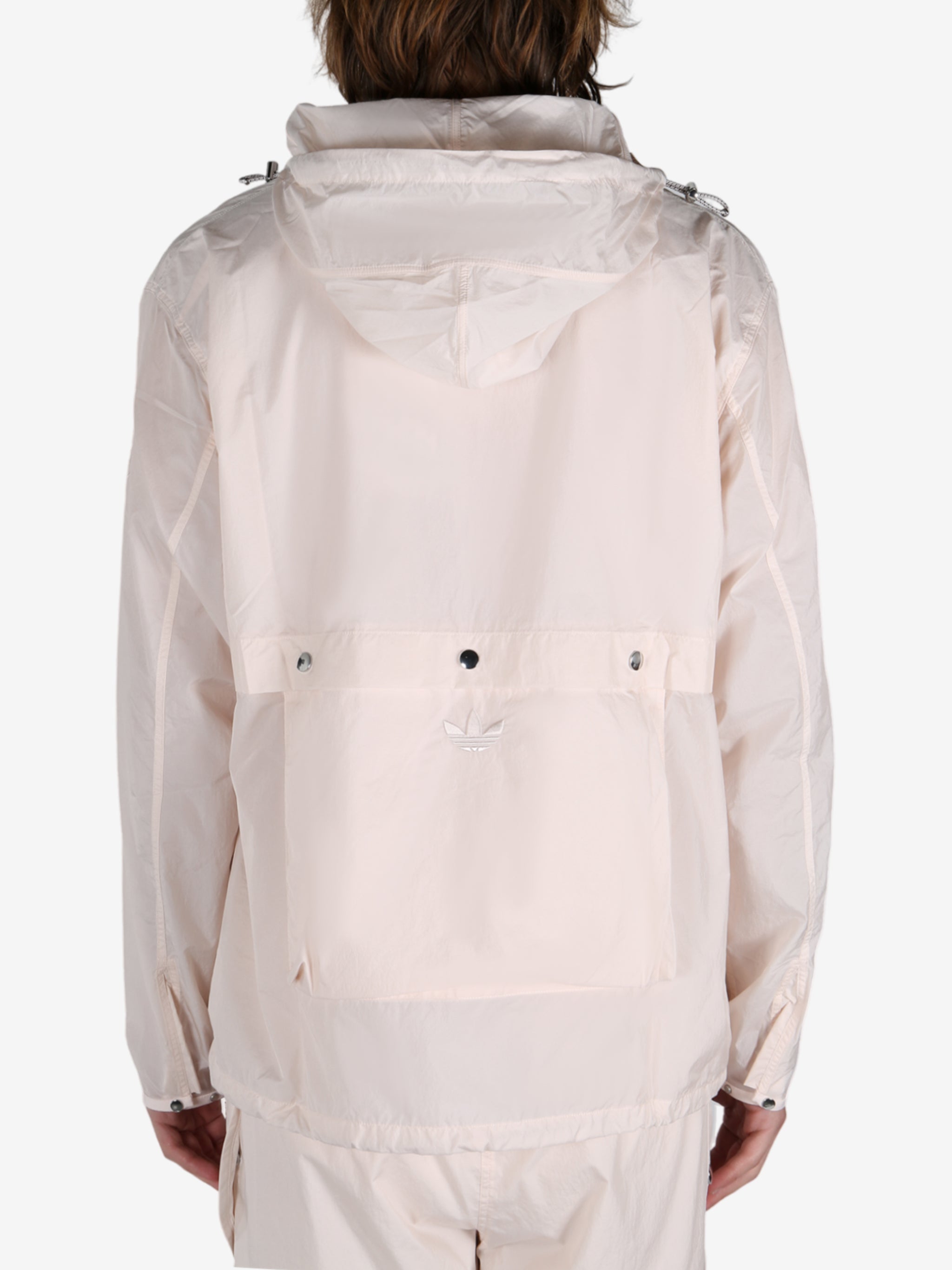 Pink jacket worn by a person, showing the jacket's fit