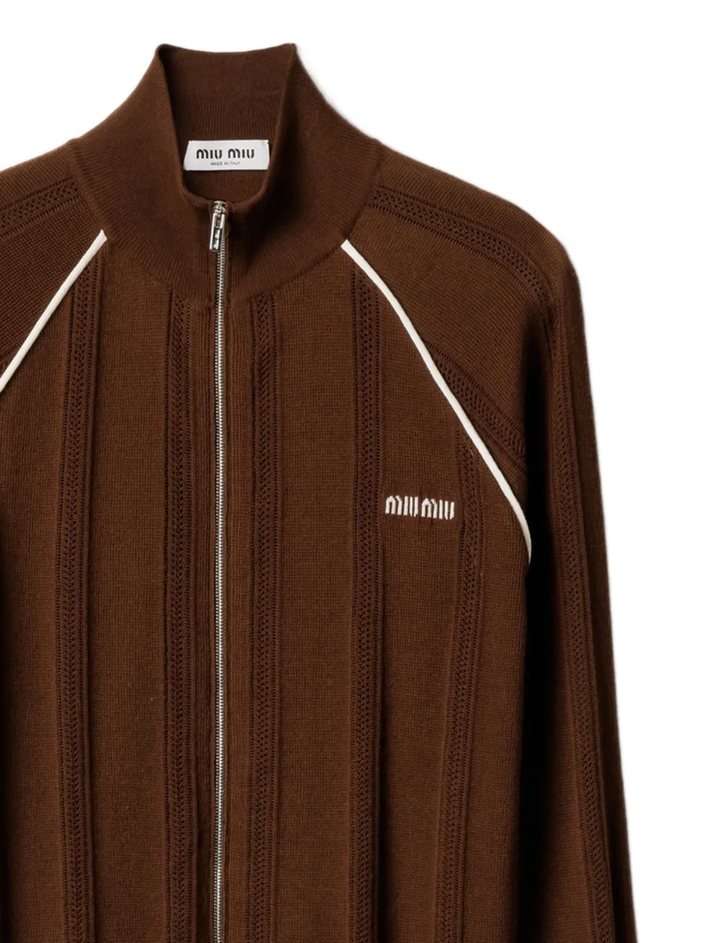 Close up of brown jacket,showing texture of the cotton fabric.
