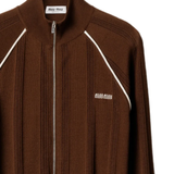 Close up of brown jacket,showing texture of the cotton fabric.