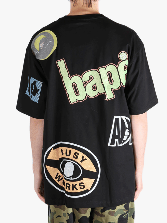 Black t-shirt worn by a person, showing the shirt's fit