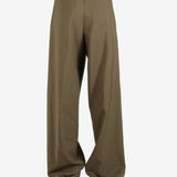 Green pant worn by a person, showing the pant's fit