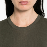 Close up of grey t-shirt, showing texture of the silk fabric