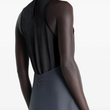 Grey dress worn by a person, showing the dress's fit