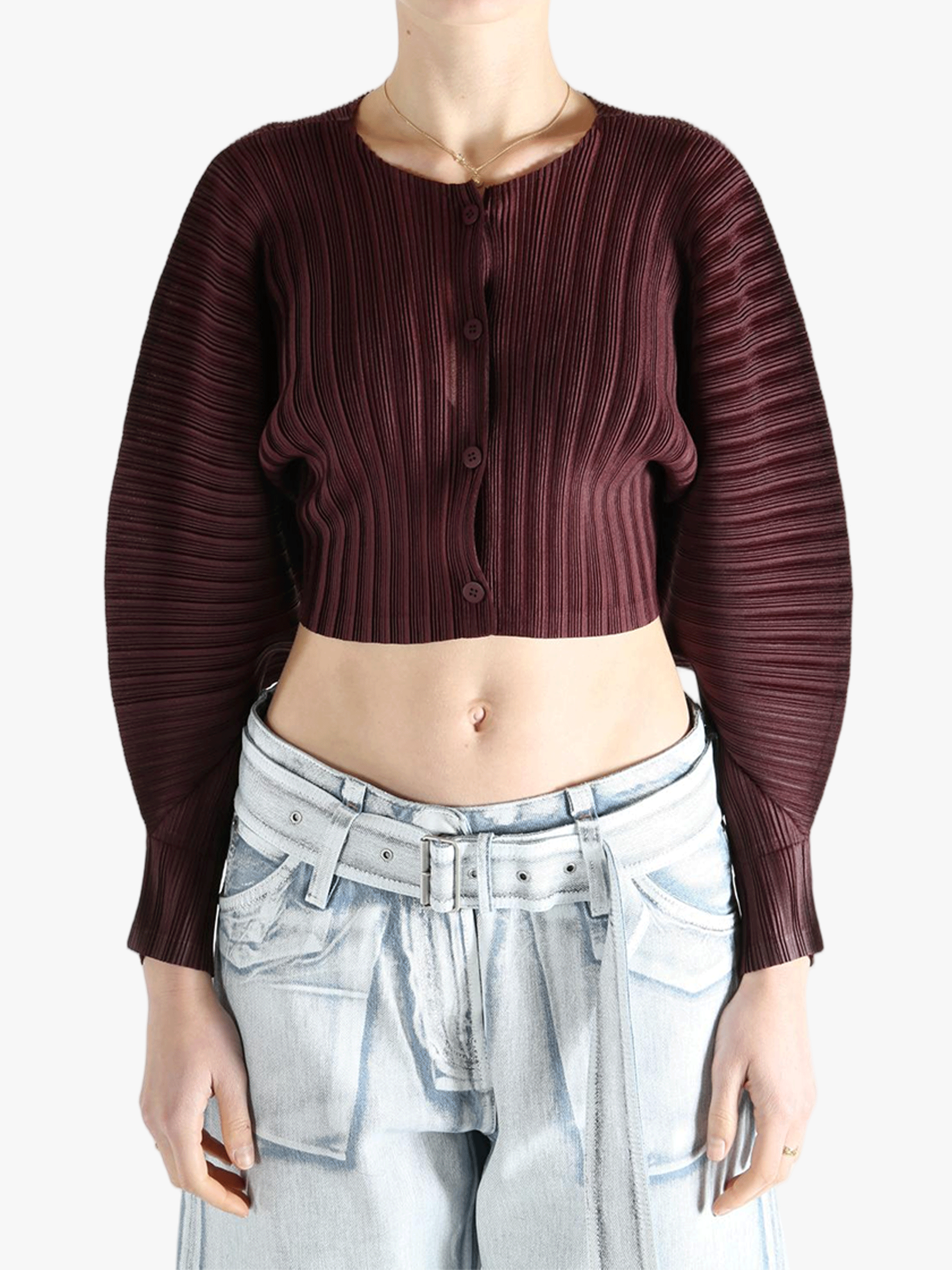 Brown cardigan worn by a person, showing the cardigan's fit