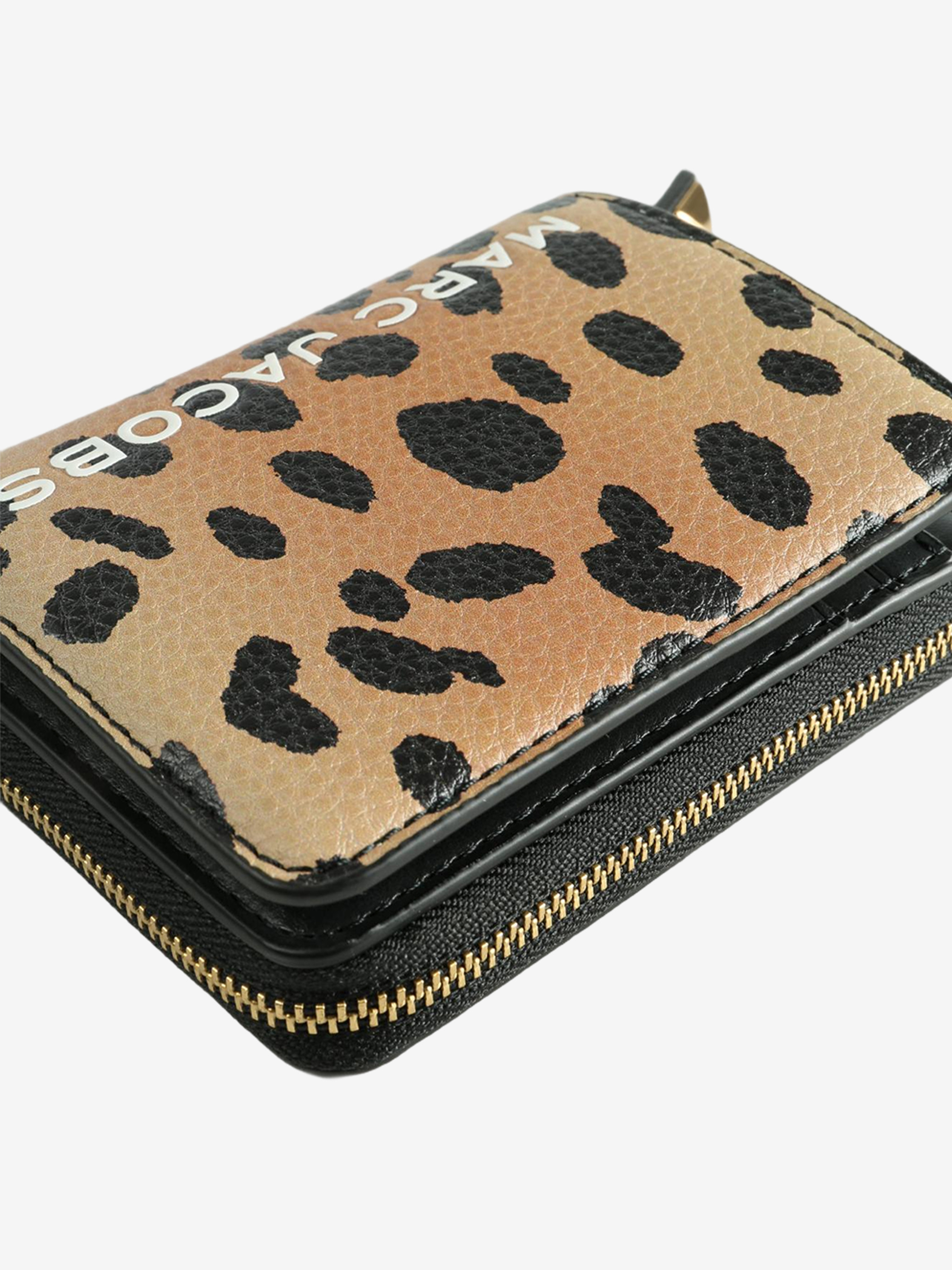 Close up of black wallet, showing texture of the Split Cow Leather fabric