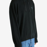 Black hoodie worn by a person, showing the hoodie's fit