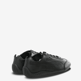 Black sneakers, side view