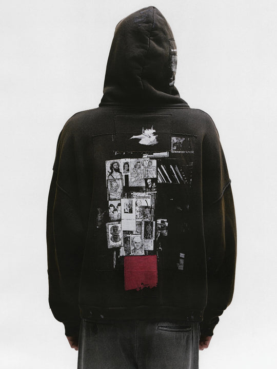 Black hoodie worn by a person, showing the hoodie