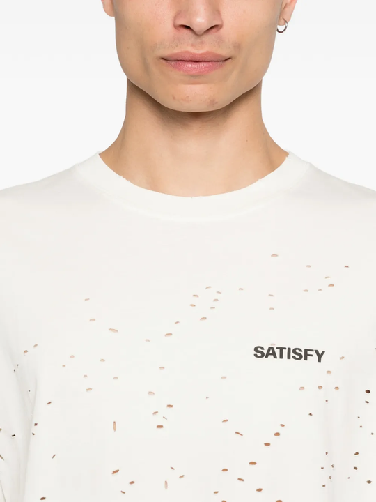 White t-shirt worn by a person, showing the t-shirt fit