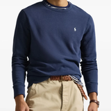 Blue sweatshirt worn by a person, showing the sweatshirt's  fit