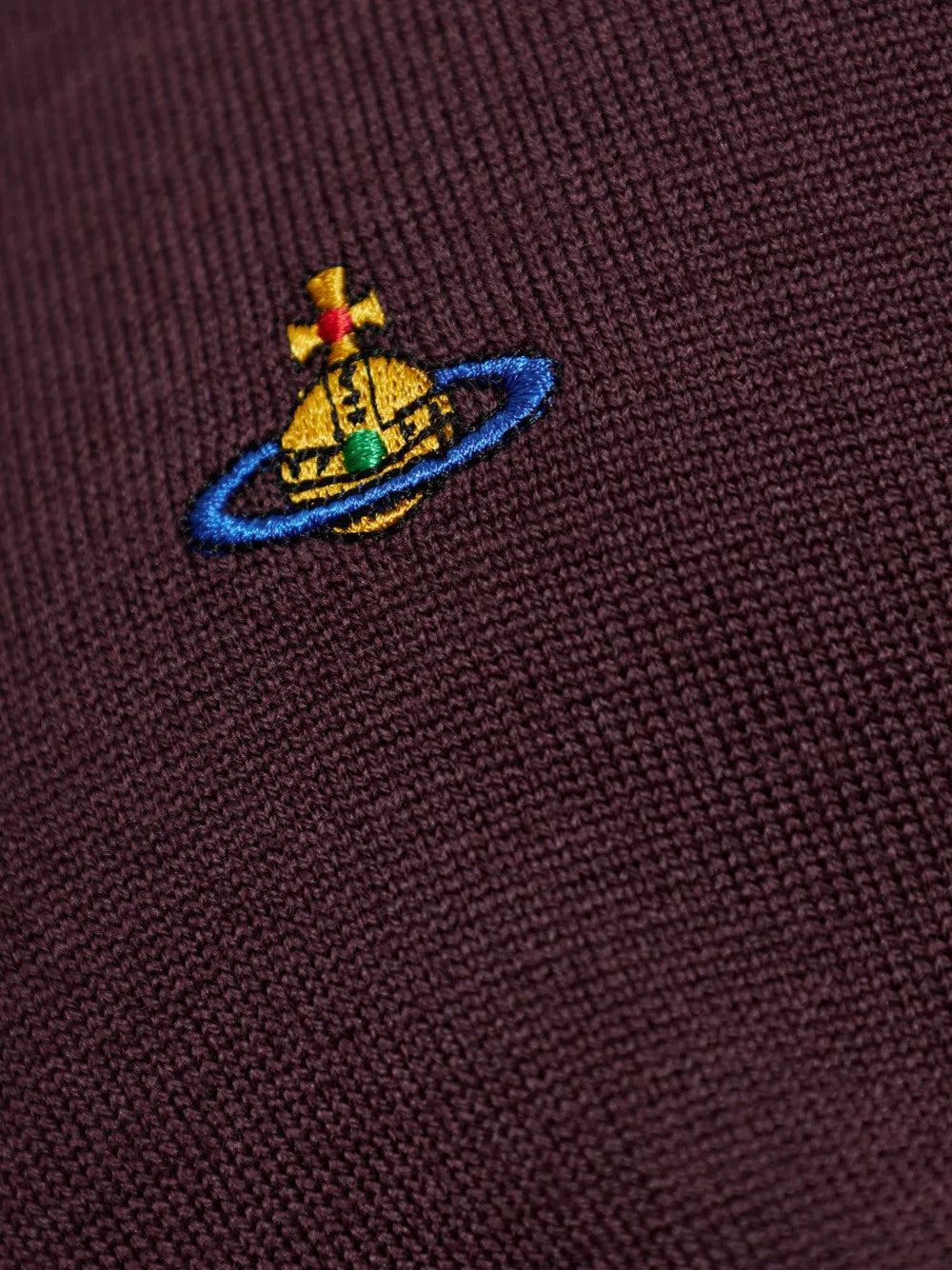 Close up of Burgundy hoodie, showing texture of the 100% wool fabric