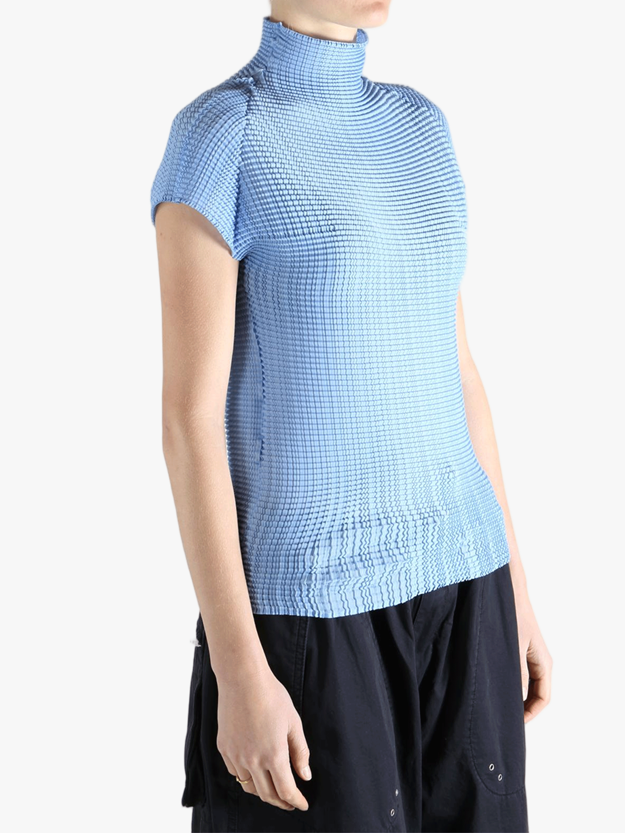 Blue t-shirt worn by a person, showing the t-shirt's fit