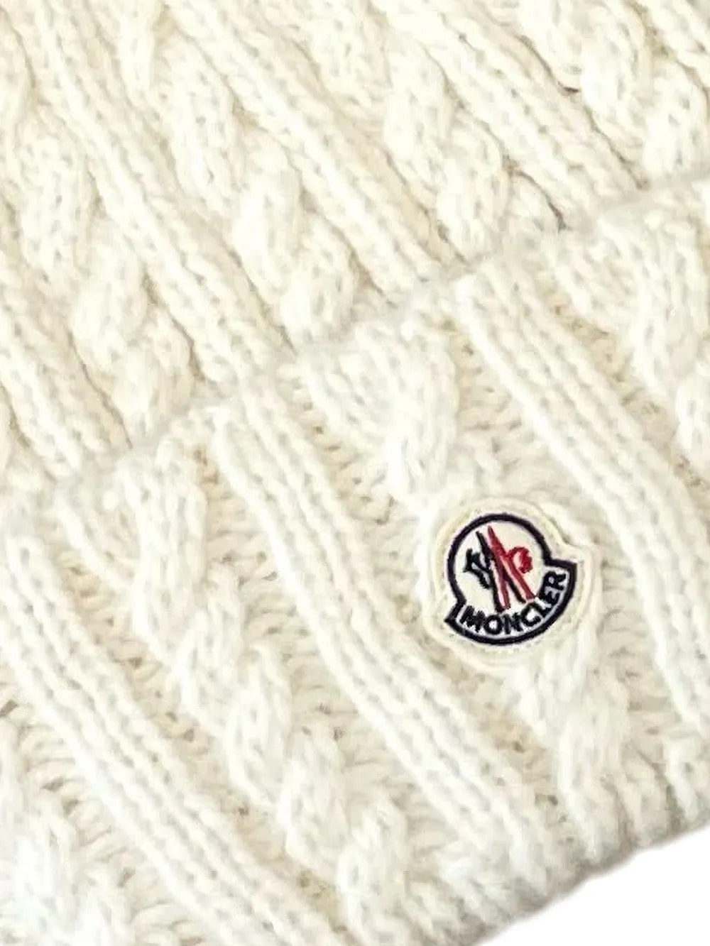 Close up of White hat, showing texture of the 43% alpaca/ 36% polyamide/ 21% wool fabric