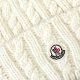 Close up of White hat, showing texture of the 43% alpaca/ 36% polyamide/ 21% wool fabric