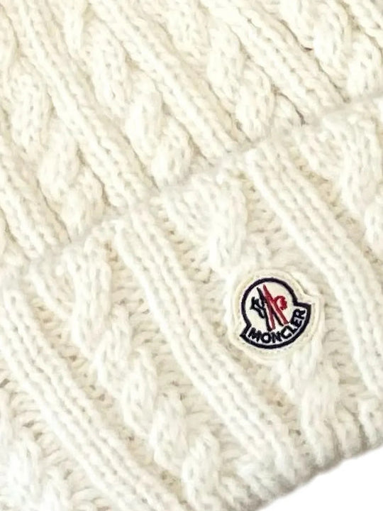 Close up of White hat, showing texture of the 43% alpaca/ 36% polyamide/ 21% wool fabric