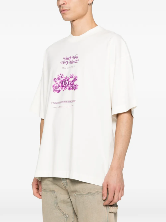 tan t-shirt worn by a person, showing the t-shirt fit