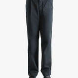 Black pants worn by a person, showing the pants fit