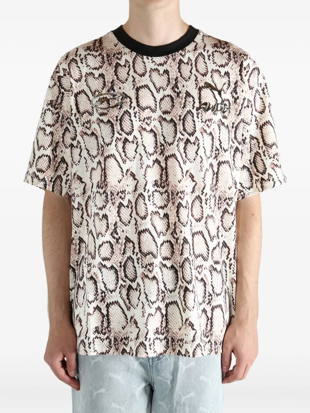 Tan t-shirts worn by a person, showing the t-shirts fit