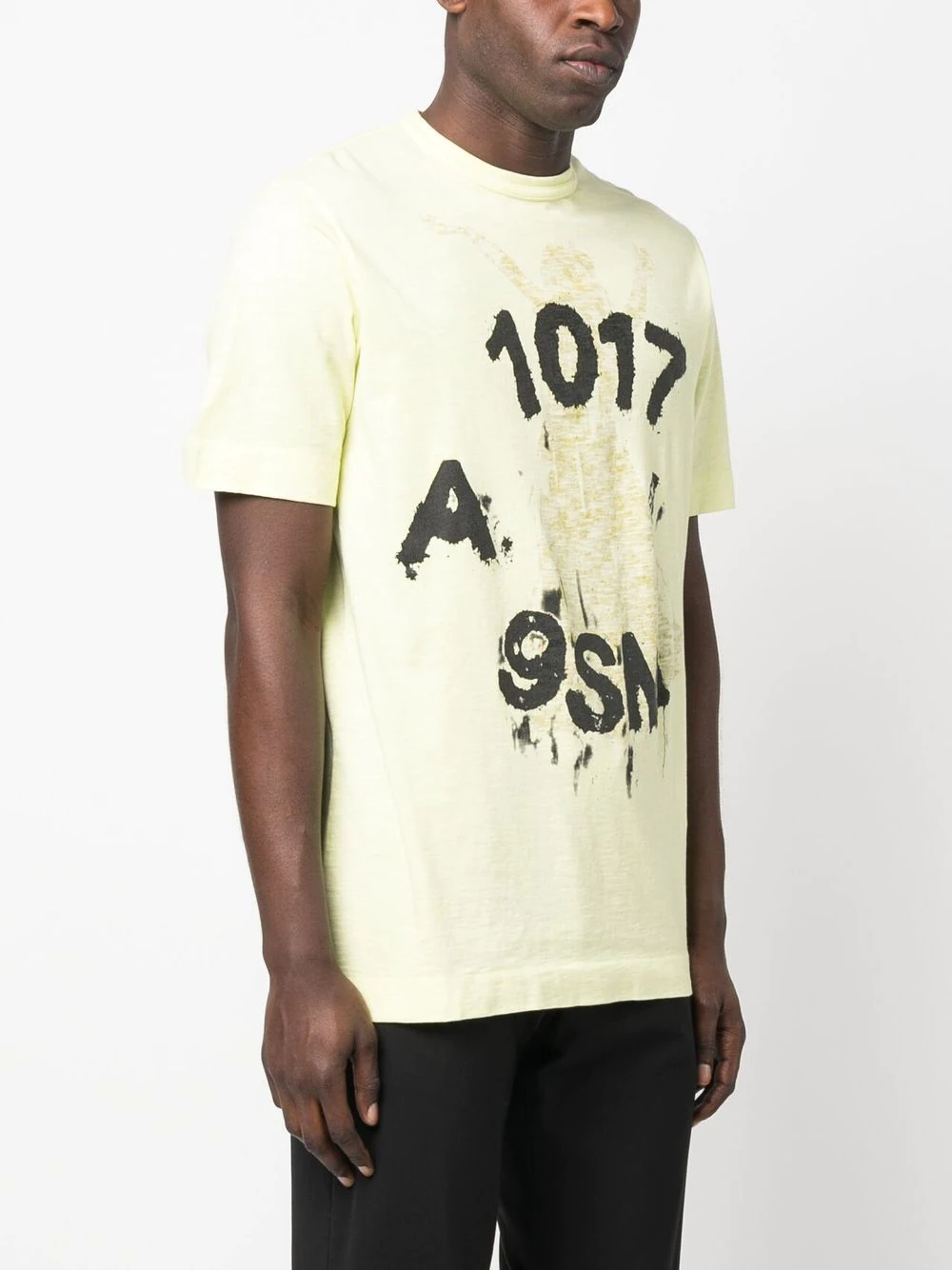 Yellow shirt worn by a person, showing the shirt's fit
