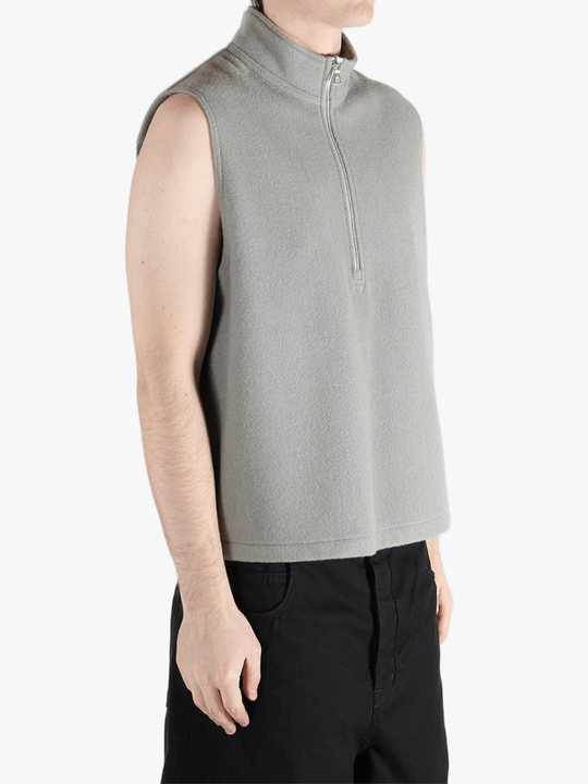 Grey top worn by a person, showing the top's fit