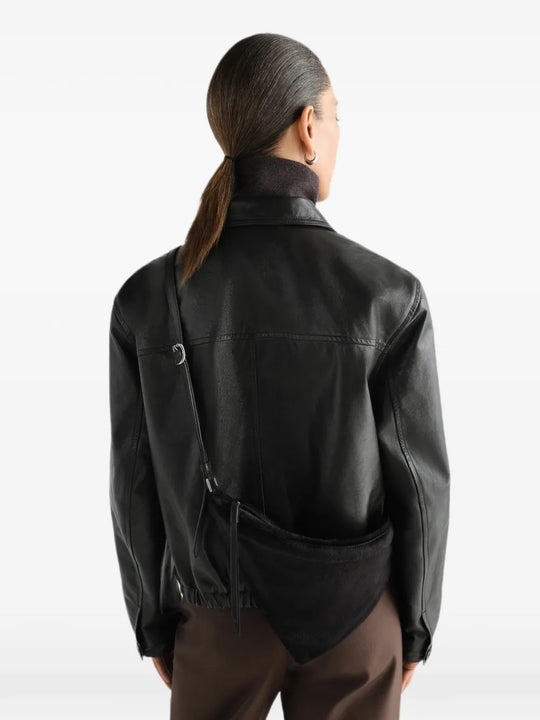 Black bag worn by a person, showing the bag fit