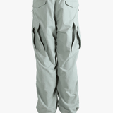 Grey pant worn by a person, showing the pant's fit