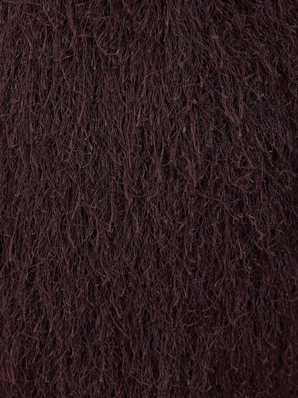 Close up of Purple skirt, showing texture of the 100% polyester fabric