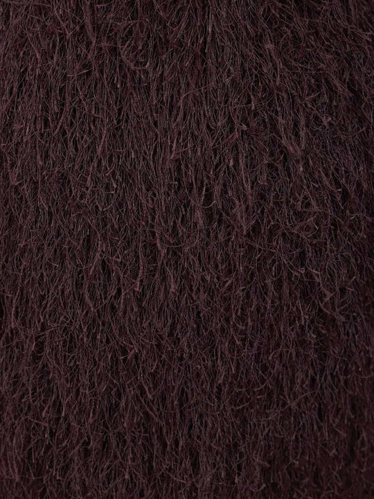 Close up of Purple skirt, showing texture of the 100% polyester fabric