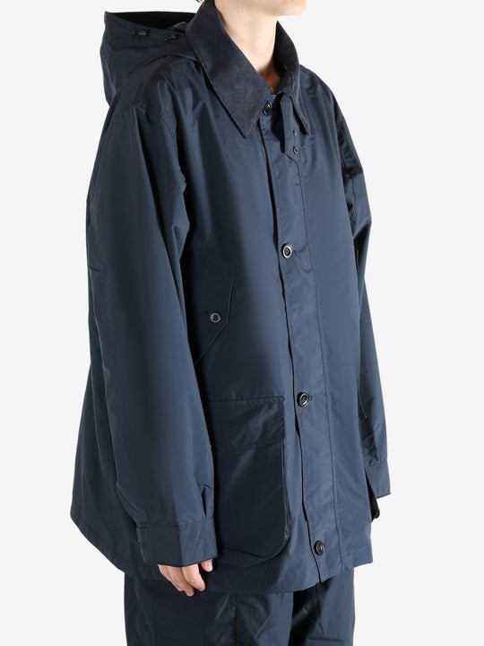 Navy jacket worn by a person, showing the jacket's fit