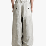 Grey pants, full body view