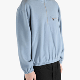 Blue hoodie worn by a person, showing the hoodie 's fit