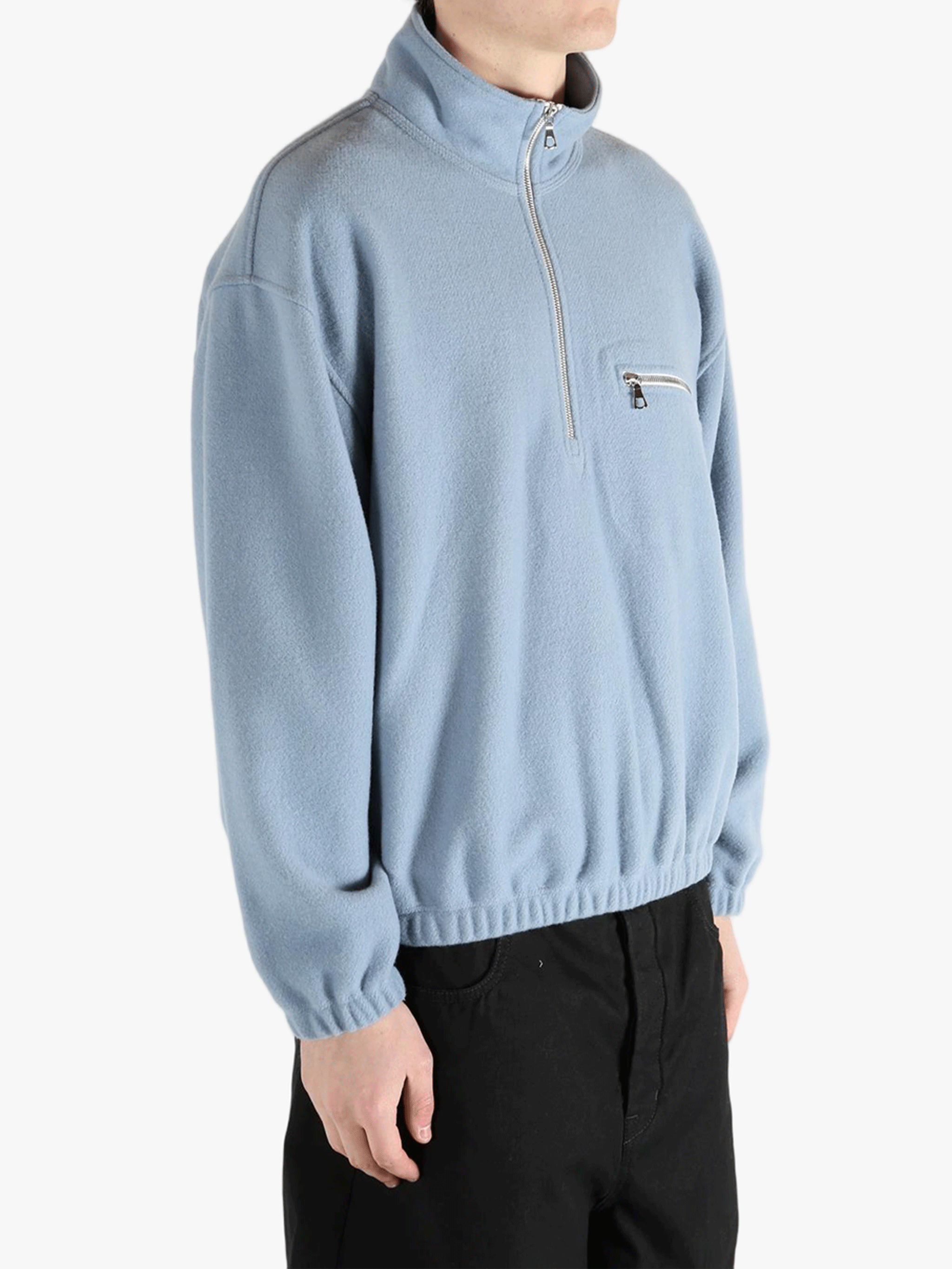 Blue hoodie worn by a person, showing the hoodie 's fit