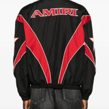 Black jackets worn by a person, showing the jackets fit