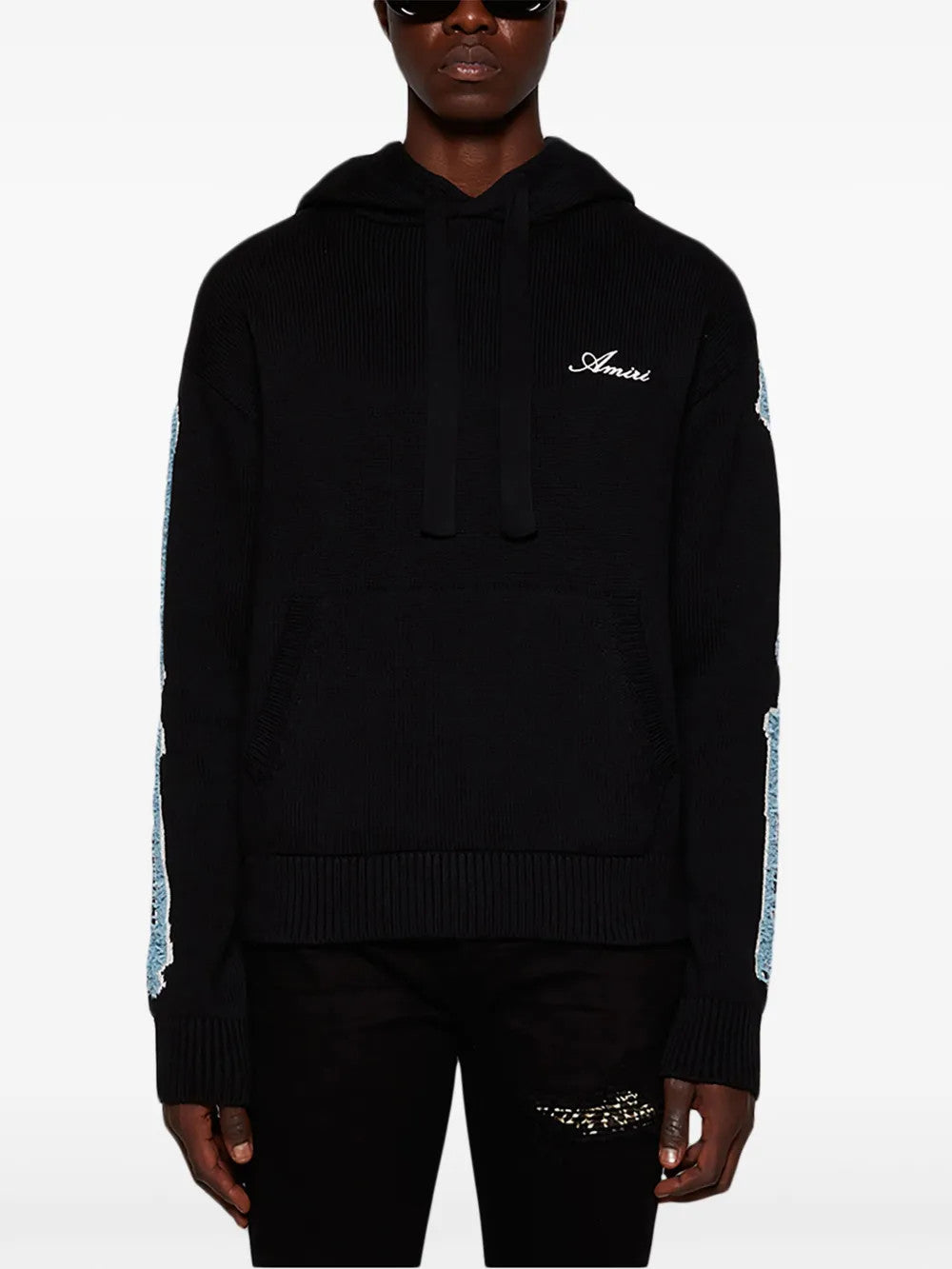 Black knitwear, full body view