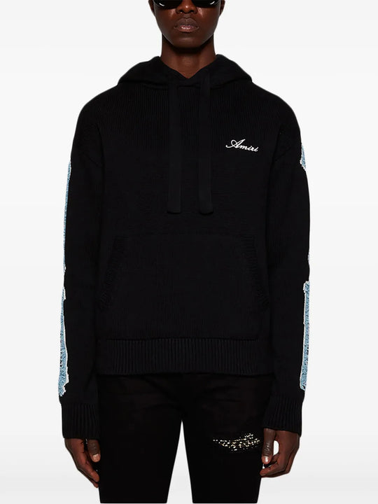 Black knitwear, full body view