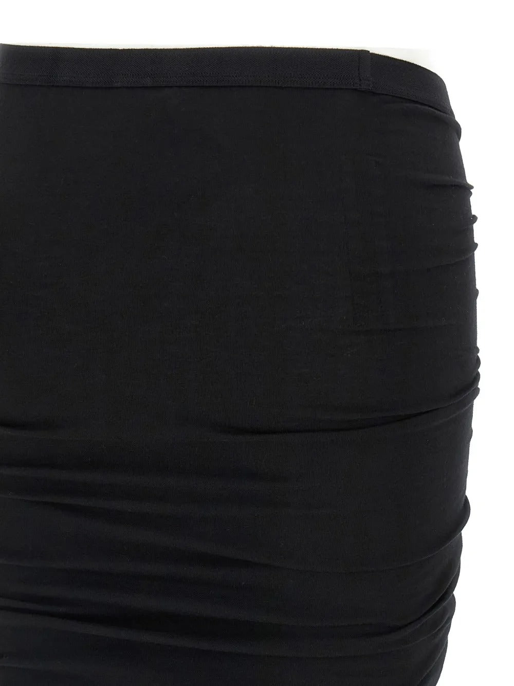Close up of black skirt, showing texture of the cotton fabric